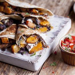 Beef and squash quesadillas with salsa and soured cream