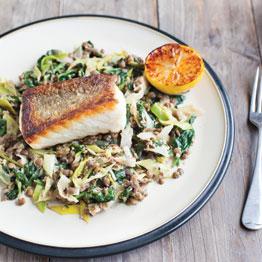 Pan-fried pollock and lentils with leeks, spinach and burnt Lemon