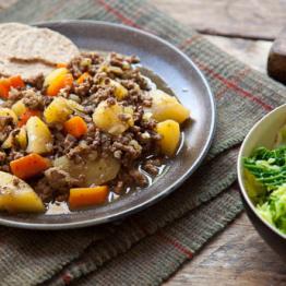 Scottish stovies with greens & oatcakes