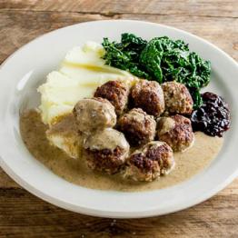 Swedish meatballs with mash, winter greens & cranberry sauce